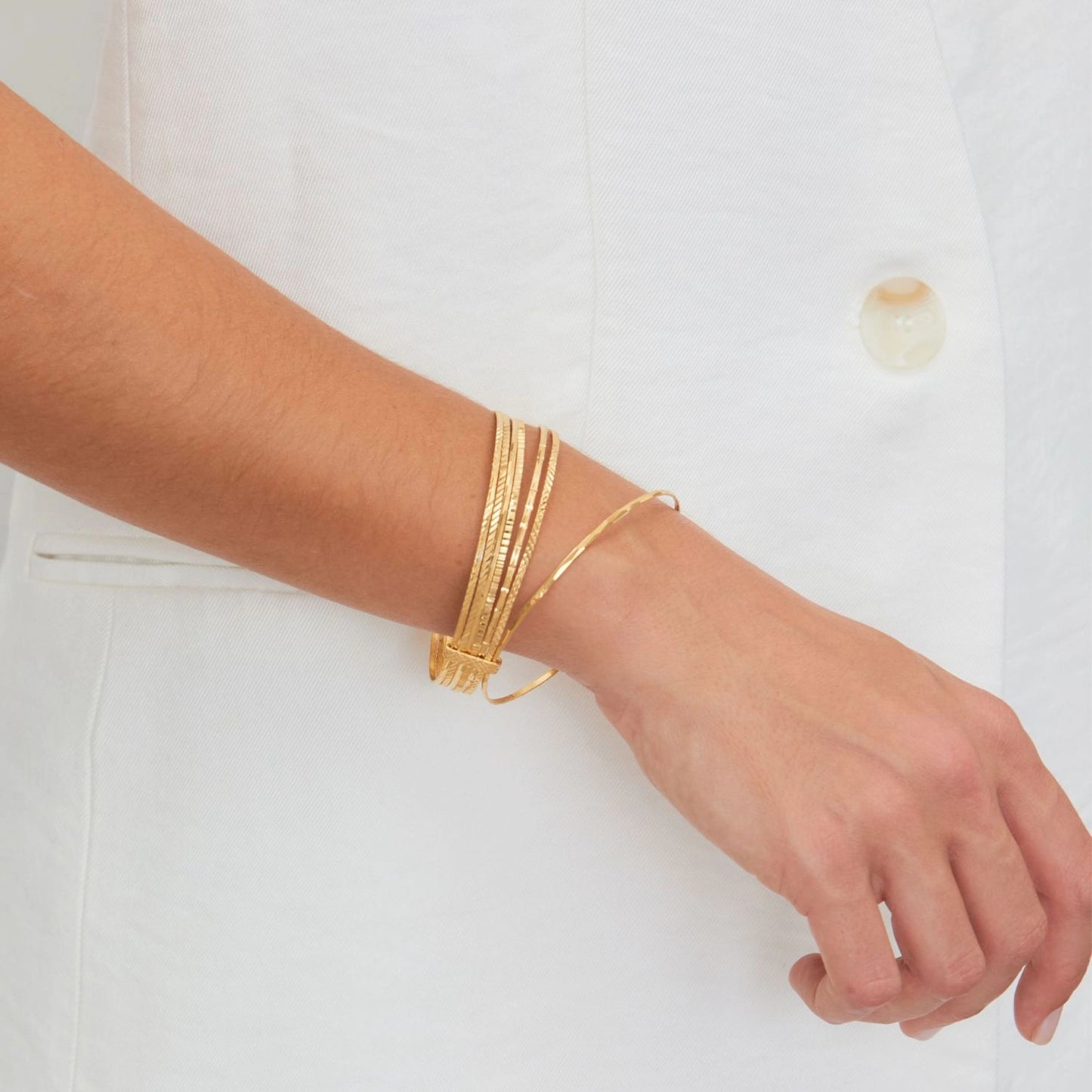 Pulsera Siete Brazaletes de Plata Bañada en Oro