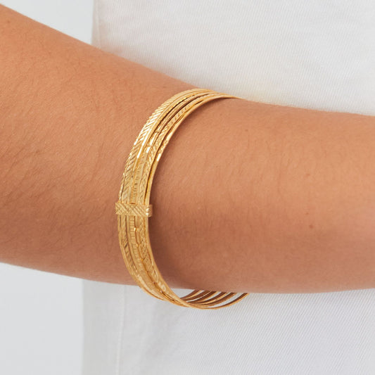 Pulsera Siete Brazaletes de Plata Bañada en Oro